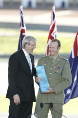Honoured … Donaldson receives the Young Australian of the Year award in 2010 from then prime minister Kevin Rudd.