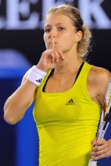 Maria Kirilenko  gestures to the crowd after beating Maria Sharapova.