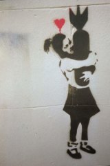 On the streets of Melbourne no more: Girl hugs a bomb.