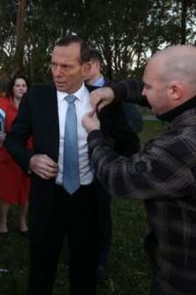 Prime Minister Tony Abbott does breakfast television interviews on the front lawns of Parliament House this morning.