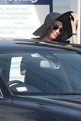 Angelina Jolie leaves a water taxi at Cleveland.