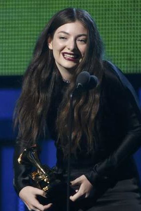 Lorde accepts the Grammy award for Song of the Year for "Royals".