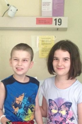 Harrison with his older sister Ella, who was the perfect donor match.
