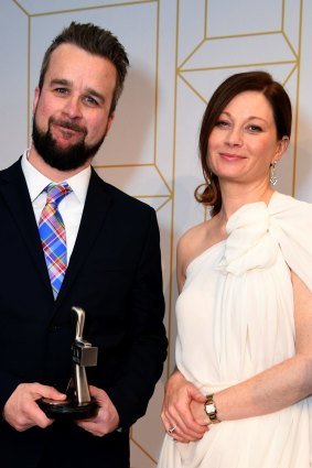 Four Corner's Justin Stevens and Morag Ramsay pose with their Logie award for the most outstanding news coverage.