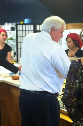 Is it teriyaki beef? Or perhaps a California roll? Clive Palmer orders sushi.