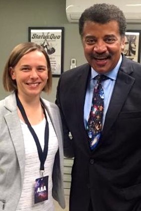 Harvey-Smith with renowned American astrophysicist Neil deGrasse Tyson in 2015.
