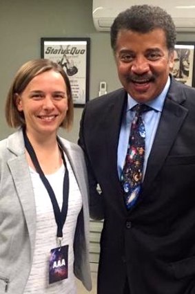 Harvey-Smith with renowned American astrophysicist Neil deGrasse Tyson in 2015.