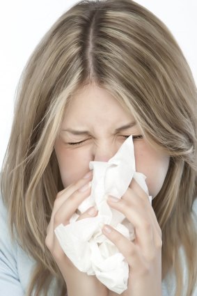If you can, cover your mouth and nose with a tissue before you sneeze.