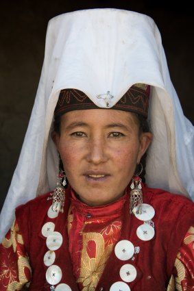 In the Pamir, married Kyrgyz women pin long white veils to their hats
