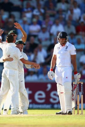 England's Tim Bresnan (right) is dejected after being adjudged caught behind off Australia's Peter Siddle (left) late on day two of the third Ashes Test.