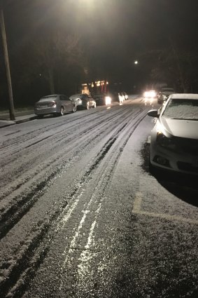 Snow on Victoria Street, Macedon on Thursday evening.
