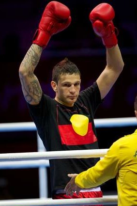 Australia's Damien Hooper in the red beat Marcus Brown from the USA in London.