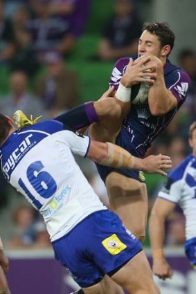 Securing the ball: the Storm's Billy Slater.
