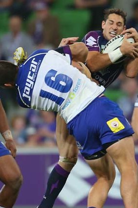 Eyes on the ball? Billy Slater and David Klemmer.