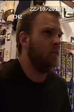 Police want to speak to this man as part of their investigation into an alleged armed robbery of a Albion adult store.