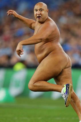 Spring in his step: a streaker runs onto the field.