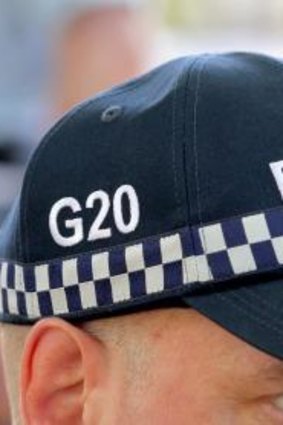Special G20 caps will be standard for all police, regardless of background.