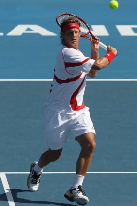 David Nalbandian plays a backhand during his match against John Isner in Auckland this week.