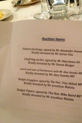 For sale ... the auction items sold at the Young Liberals dinner, including the chaff-bag jacket, signed by Alan Jones.