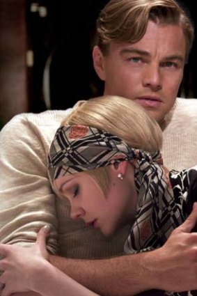 Leonardo DiCaprio, as Jay Gatsby and Carey Mulligan as Daisy Buchanan in a scene from Baz Luhrmann's <em>The Great Gatsby</em>.