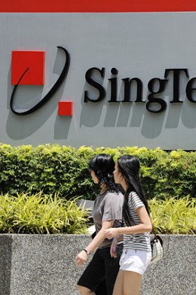 SingTel group reported its first profit decline since 2009.