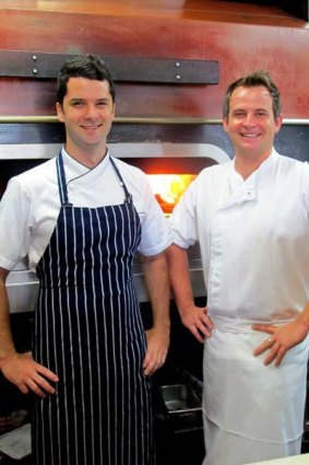 Rhett Willis (right), the executive chef of inundated Riverside restaurant Jellyfish, is working alongside his CharCharChar counterpart Ben Williamson as his restaurant gets back on its feet.