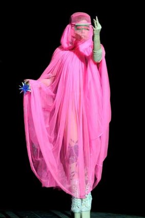 Lady Gaga acted as MC for Phillip Treacy, donning a neon veil and sky-high McQueen heels to do so.