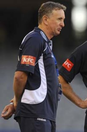 How the years have flown: Coach Ernie Merrick and captain Kevin Muscat plan tactics before Victory's A-League semi-final against Sydney FC in 2010.