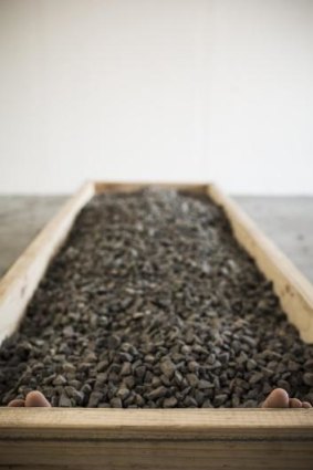 Artist Lucas Davidson plans to be buried in gravel at <i>Doing Time's</i> opening night, to explore the feeling of incarceration.