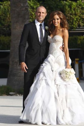 Newlyweds Chris Judd and Rebecca Twigley at Albert Park Lake.