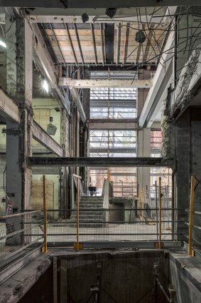 Photos in the Occupied exhibition show what looks like a blown-up building: the RMIT New Academic Street in the process of redevelopment. 