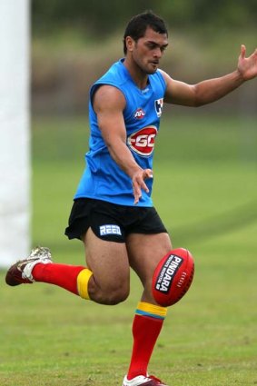 Karmichael Hunt training for Gold Coast.