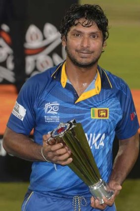 Kumar Sangakkara poses with the Man of the Match trophy.