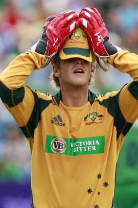 The tension builds as Tim Paine reacts after missing a throw.