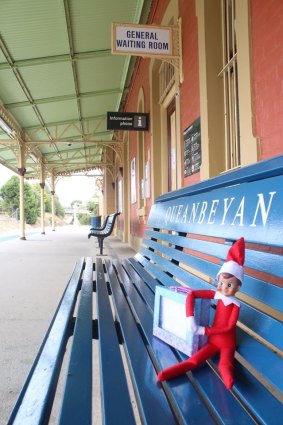 The Elf on the Shelf pulls up a pew at Queanbeyan Station.