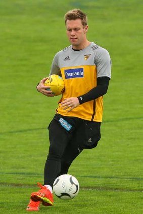 Sam Mitchell shows off his dexterity at training.