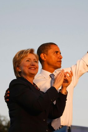 HiIlary Clinton applauds as Democratic presidential candidate Barack Obama acknowledges the crowd at a Florida campaign rally.