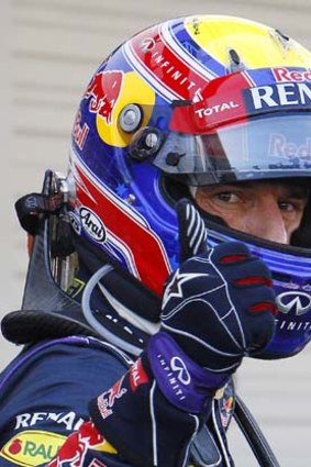 Leading the way: Red Bull's Mark Webber gives the thumbs up at Suzuka.