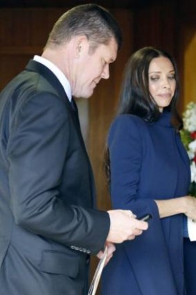 James Packer and Erica Baxter arrive for Paul Ramsay's funeral.