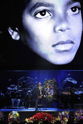 Singer Usher performs during the memorial service for Michael Jackson.