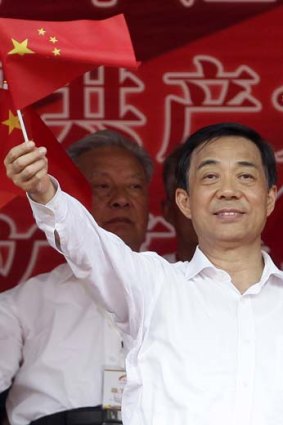 Bo Xilai waving the flag last year.
