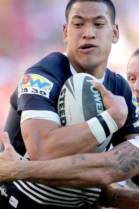 On fire . . . Israel Folau of the Broncos.