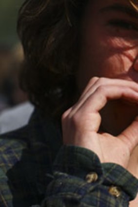 A man puffs on a marijuana cigarette at the University of Colorado.
