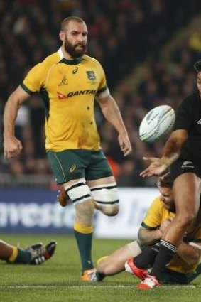 All Blacks winger Julian Savea finds Pat McCabe hindering his run as Scott Fardy looks on during Saturday night's Bledisloe Cup game in Auckland.