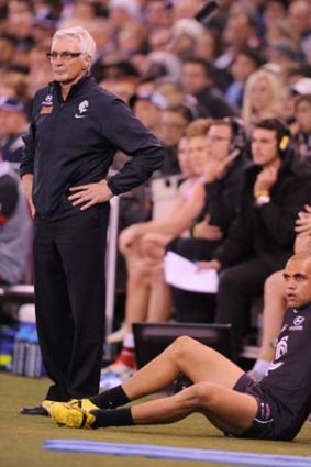 Carlton's coach Mick Malthouse on the sidelines with Chris Yarran.