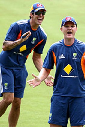 Doug Bollinger, right, and Mitchell Johnson at training. Bollinger will replace Johnson for the second Test.