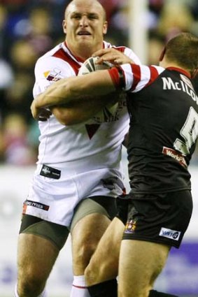 Michael Weyman is tackled by Michael McIlorum.