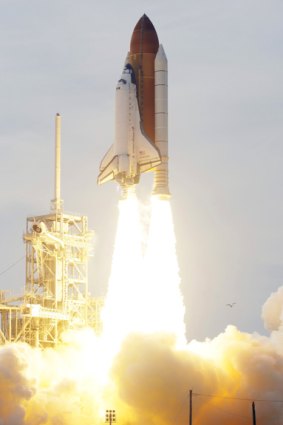 Space shuttle Endeavour blasts off from the Kennedy Space Centre at Cape Canaveral.