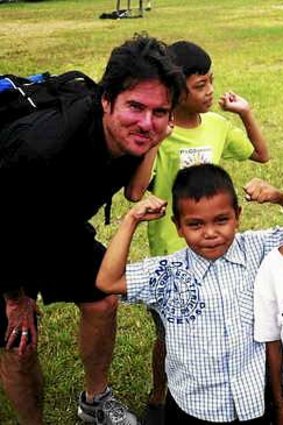 Steve Mascord with children at an orphanage in Manila.