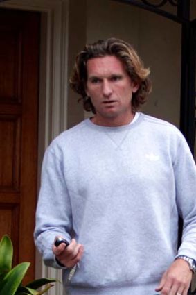 James Hird outside his home this morning.